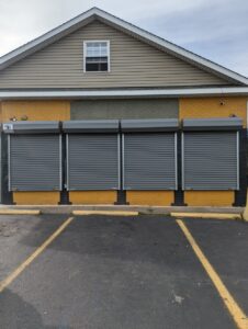 rolling steel gates installed on back of building